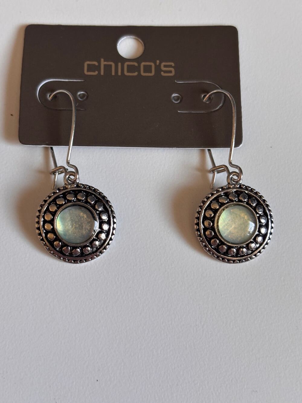 New with tag Chicos Silvertone dangle earrings with iridescent center